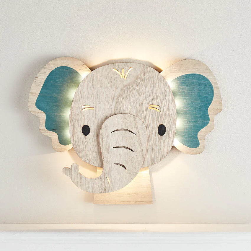 Wandlampe aus Holz in Elefantenform mit sanftem Licht für das Kinderzimmer.