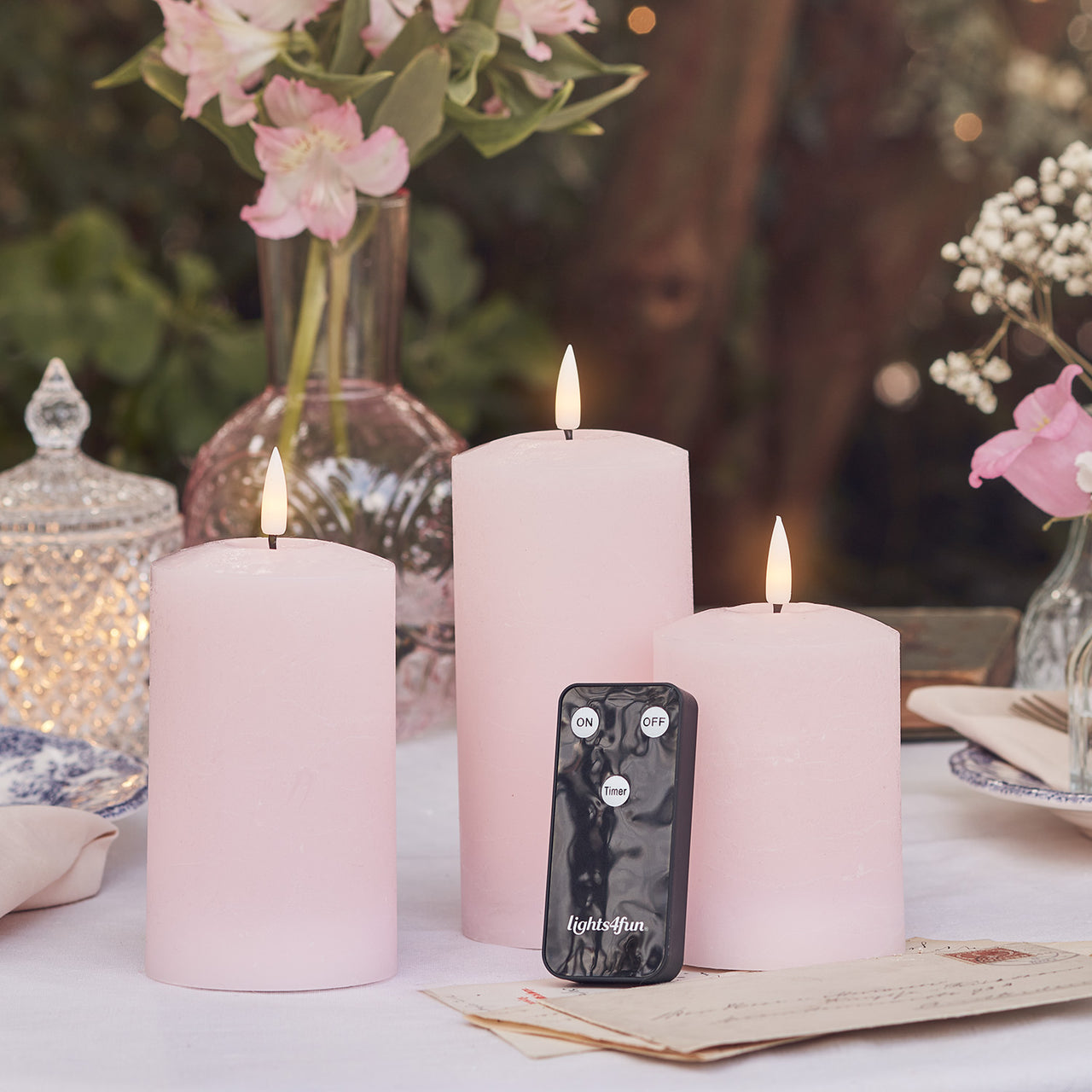 TruGlow® LED Kerzen Echtwachs Trio rosa mit Fernbedienung