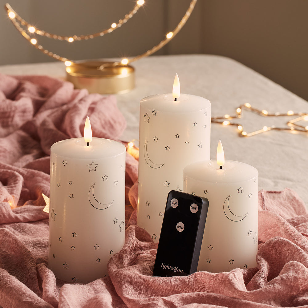 TruGlow® LED Kerzen Echtwachs Trio Mond und Sterne mit Fernbedienung
