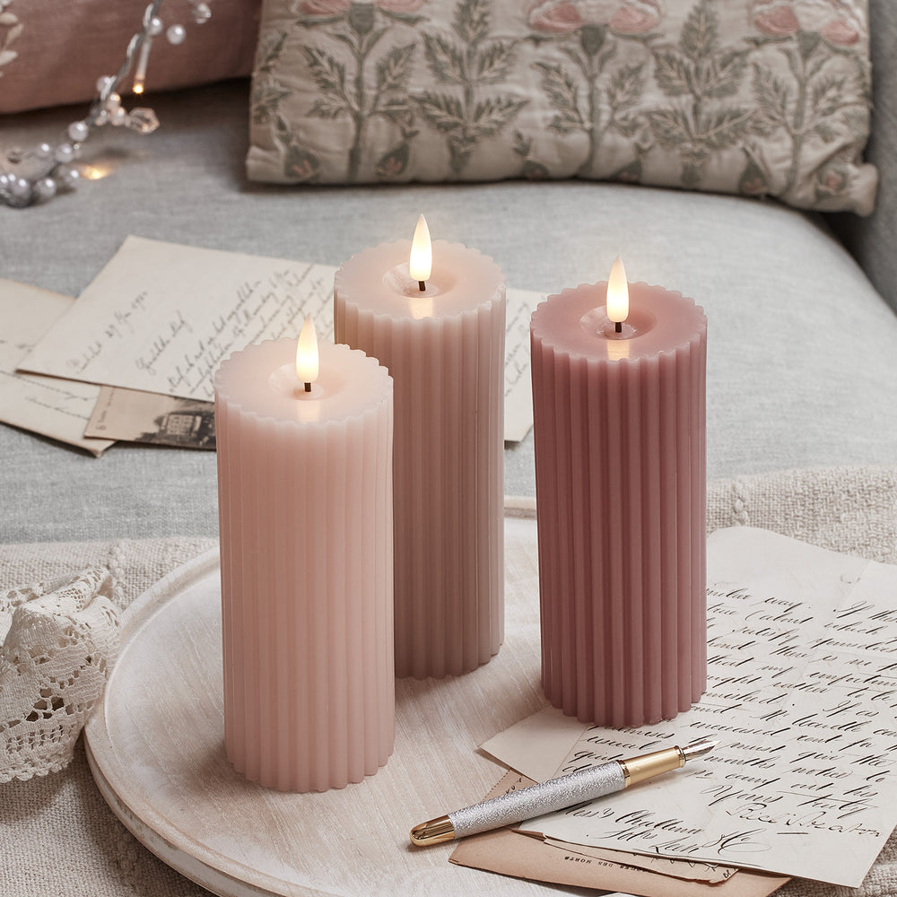 TruGlow® LED Kerzen Echtwachs Trio rosa geriffelt mit Fernbedienung