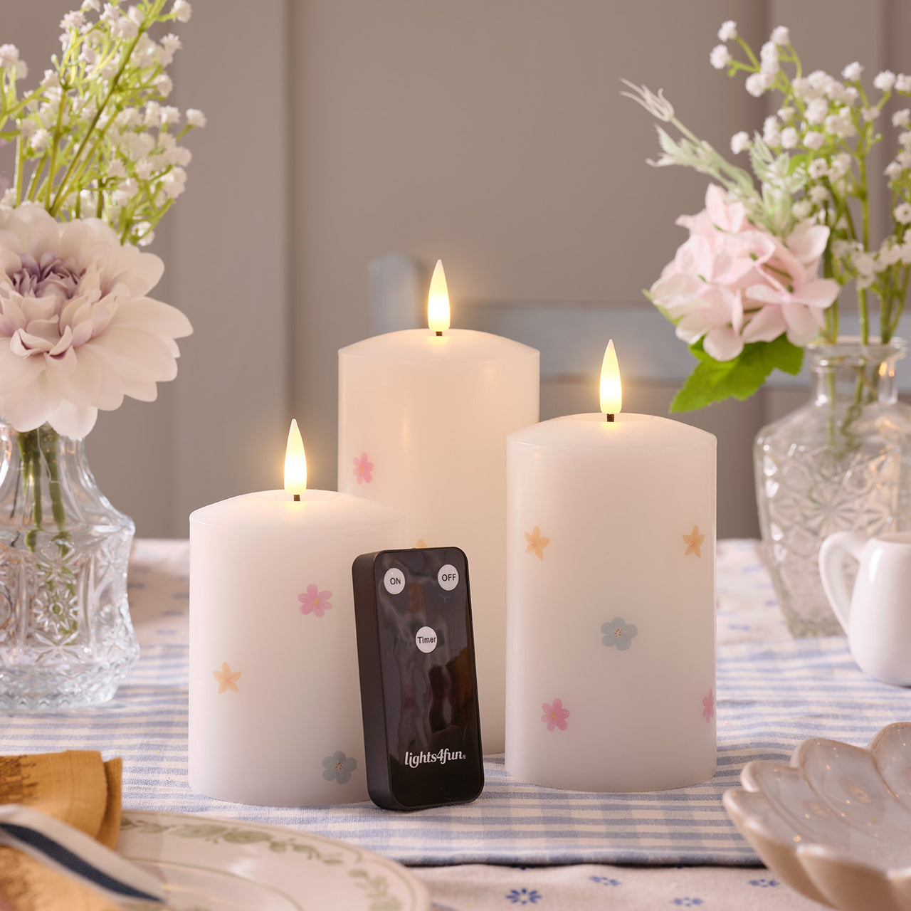 3er Set TruGlow® LED-Kerzen mit Blumen & Fernbedienung