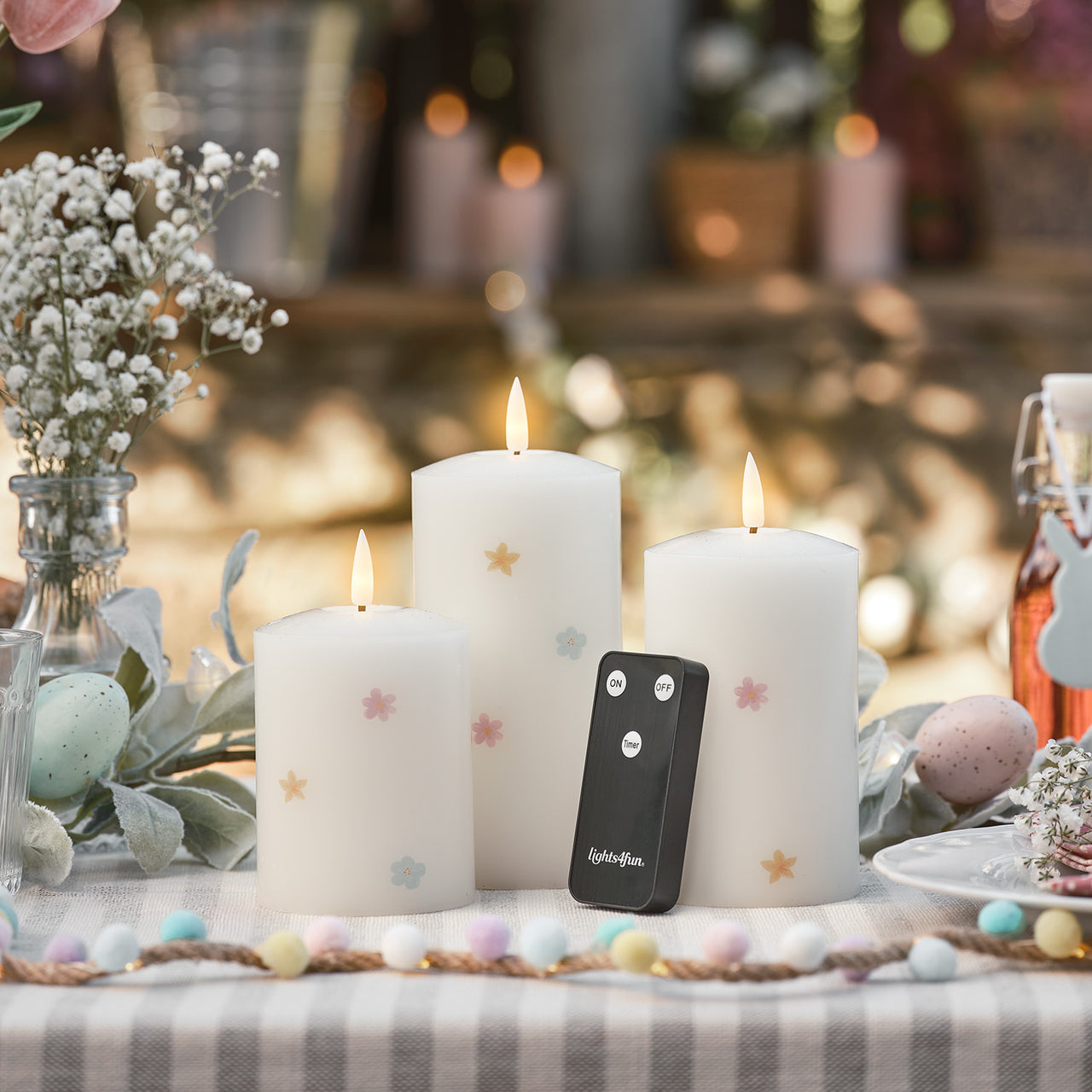 3er Set TruGlow® LED-Kerzen mit Blumen & Fernbedienung outdoor