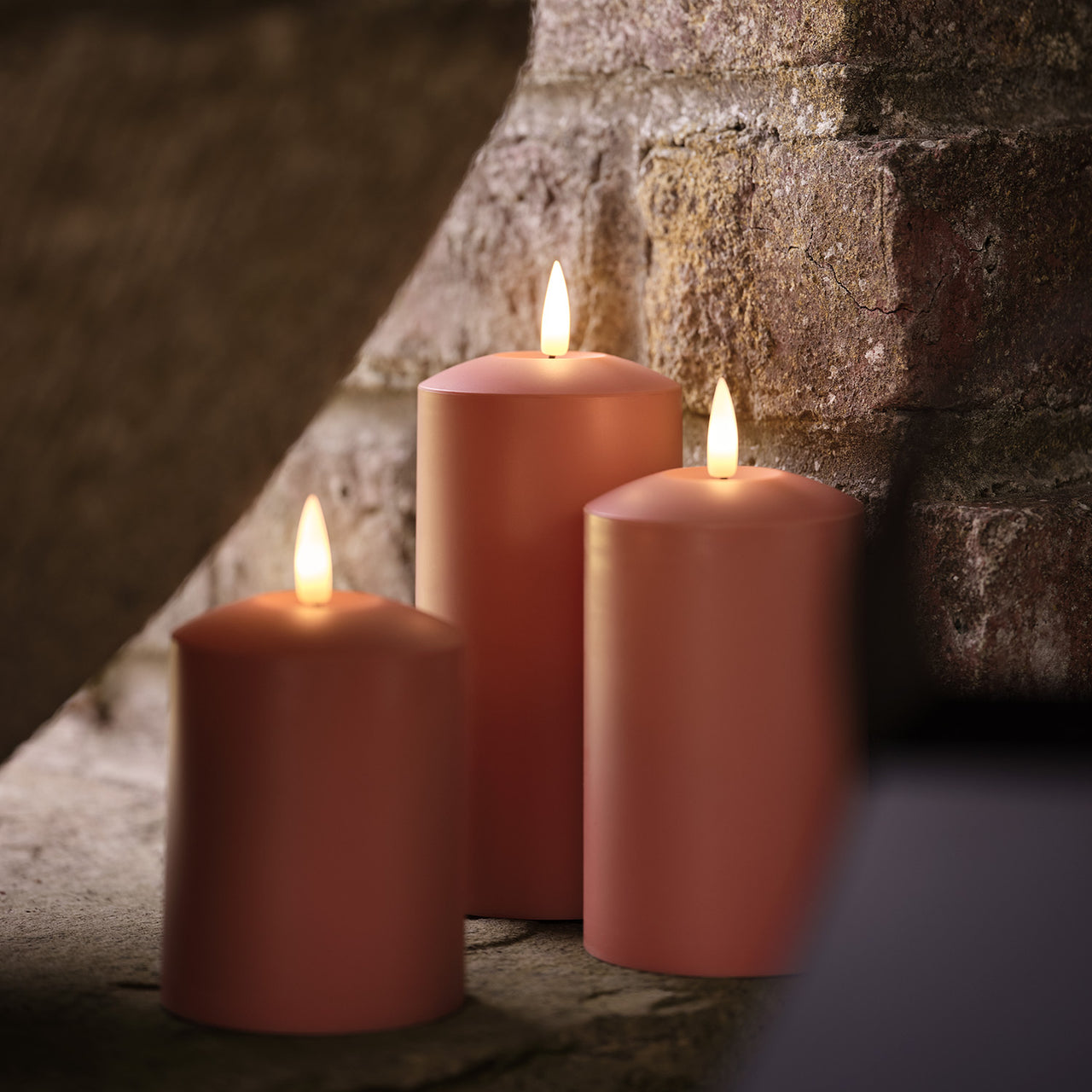TruGlow® LED Outdoor Kerzen Trio terracottafarben mit Fernbedienung