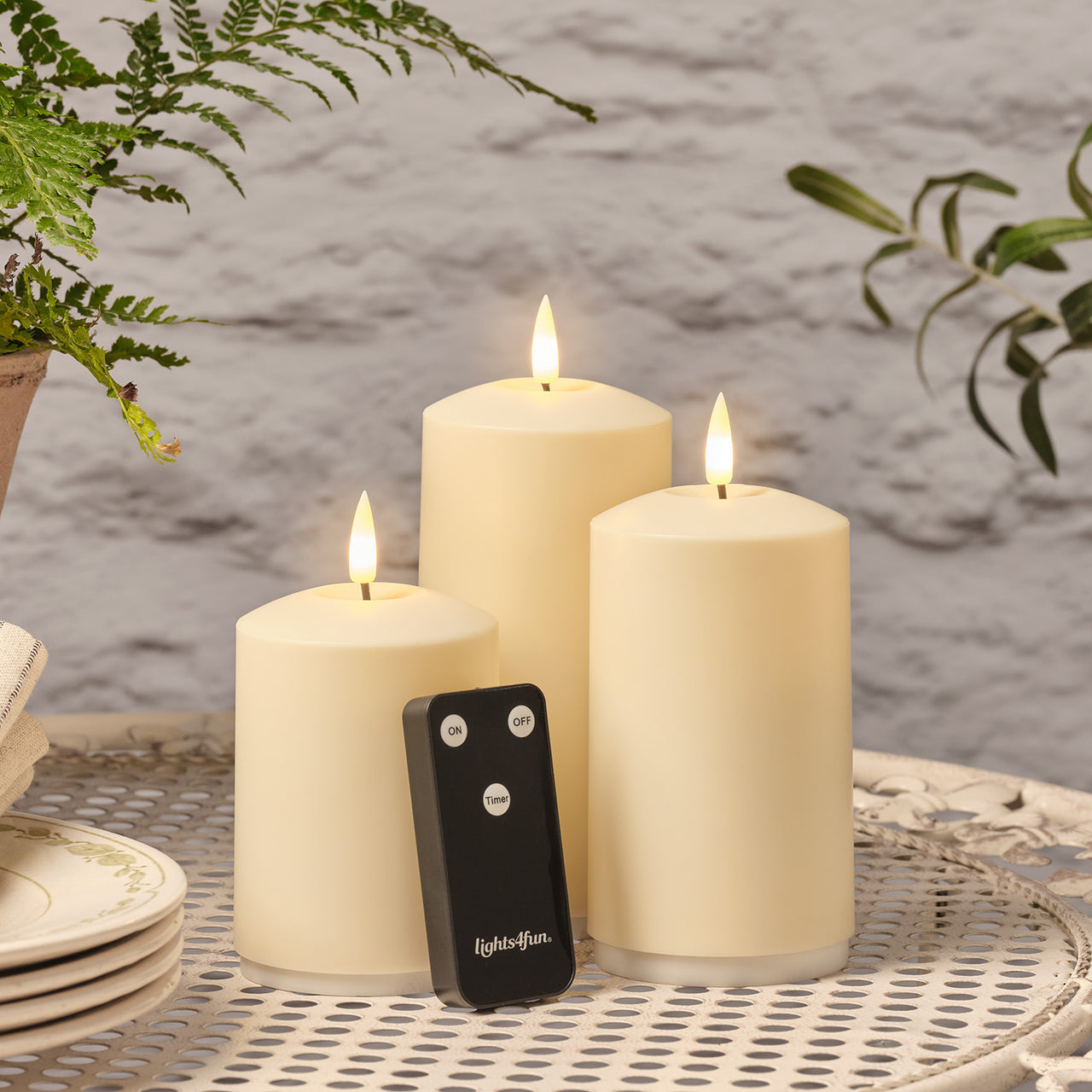 3er Set TruGlow® wiederaufladbare Outdoorkerzen mit Fernbedienung