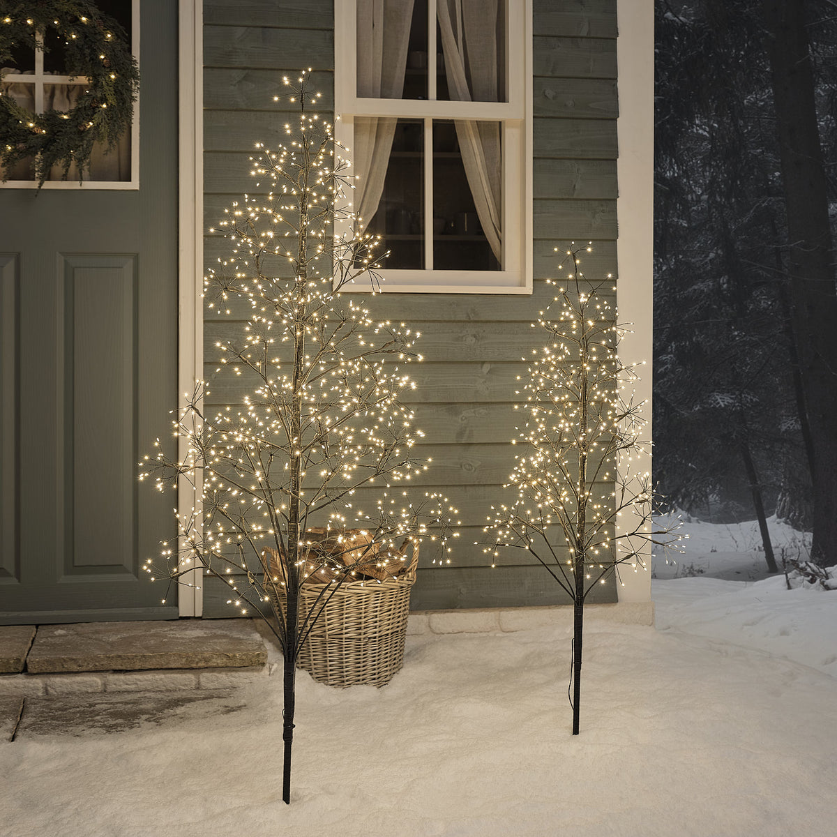 2er Set schwarze Starburst LED-Lichterbäume 150 cm und 120 cm mit Timer