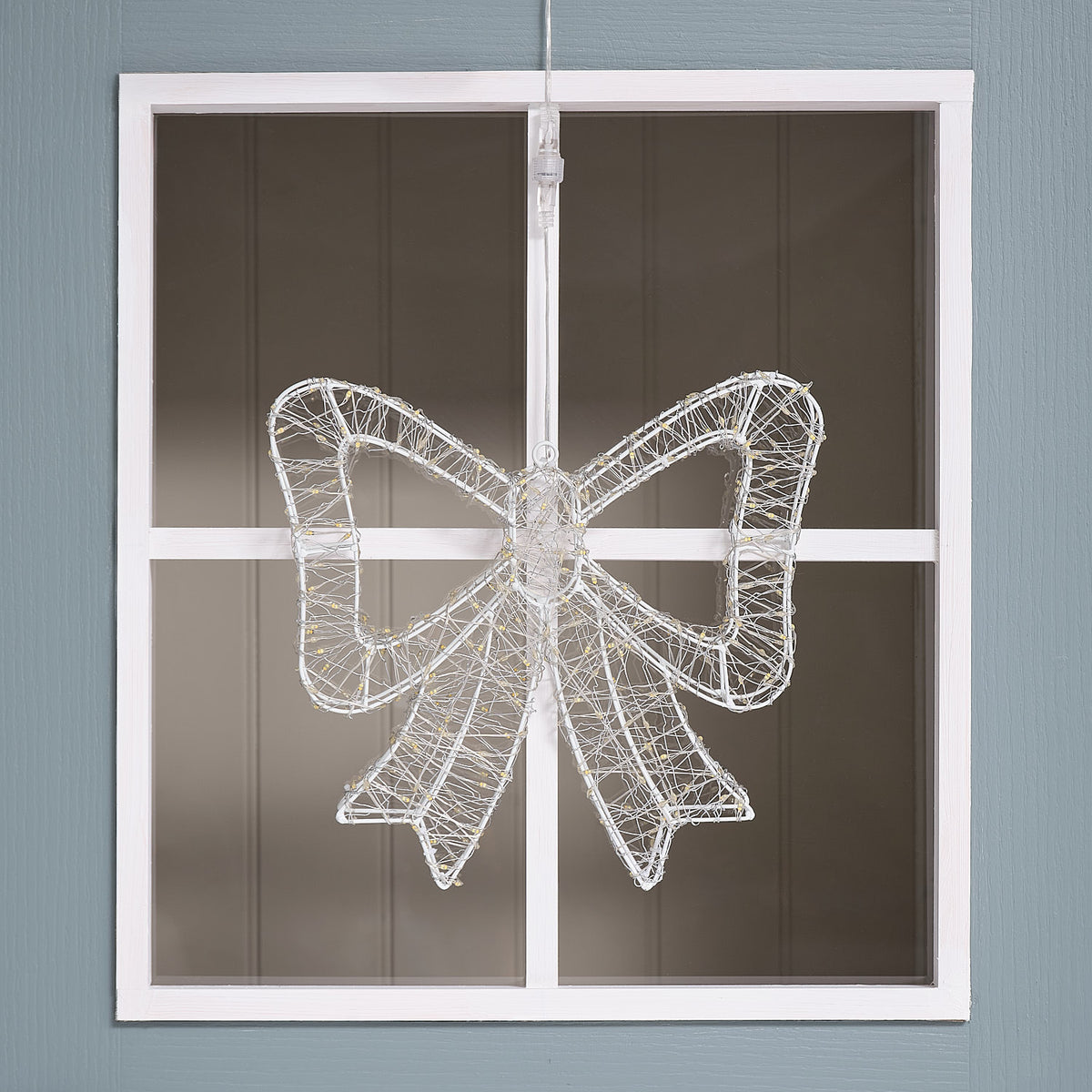 Bicolor LED-Schleife außen unbeleuchtet an einem Fensterrahmen