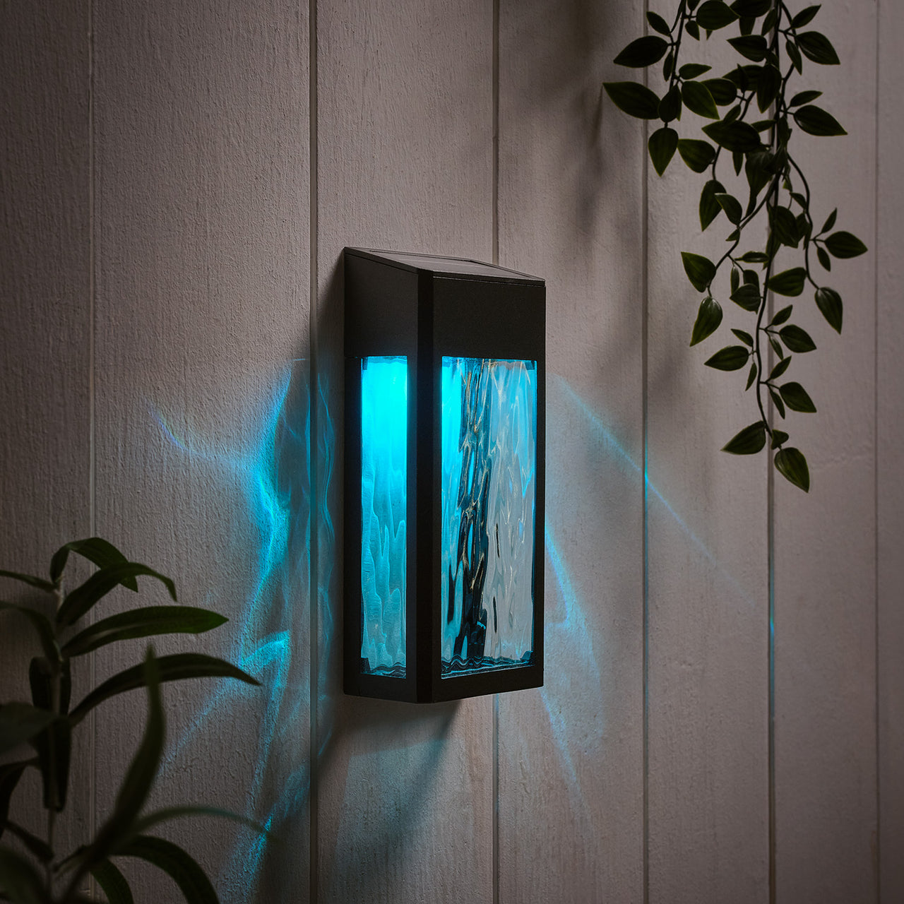 LED Solar Wandleuchte aus Glas schwarz