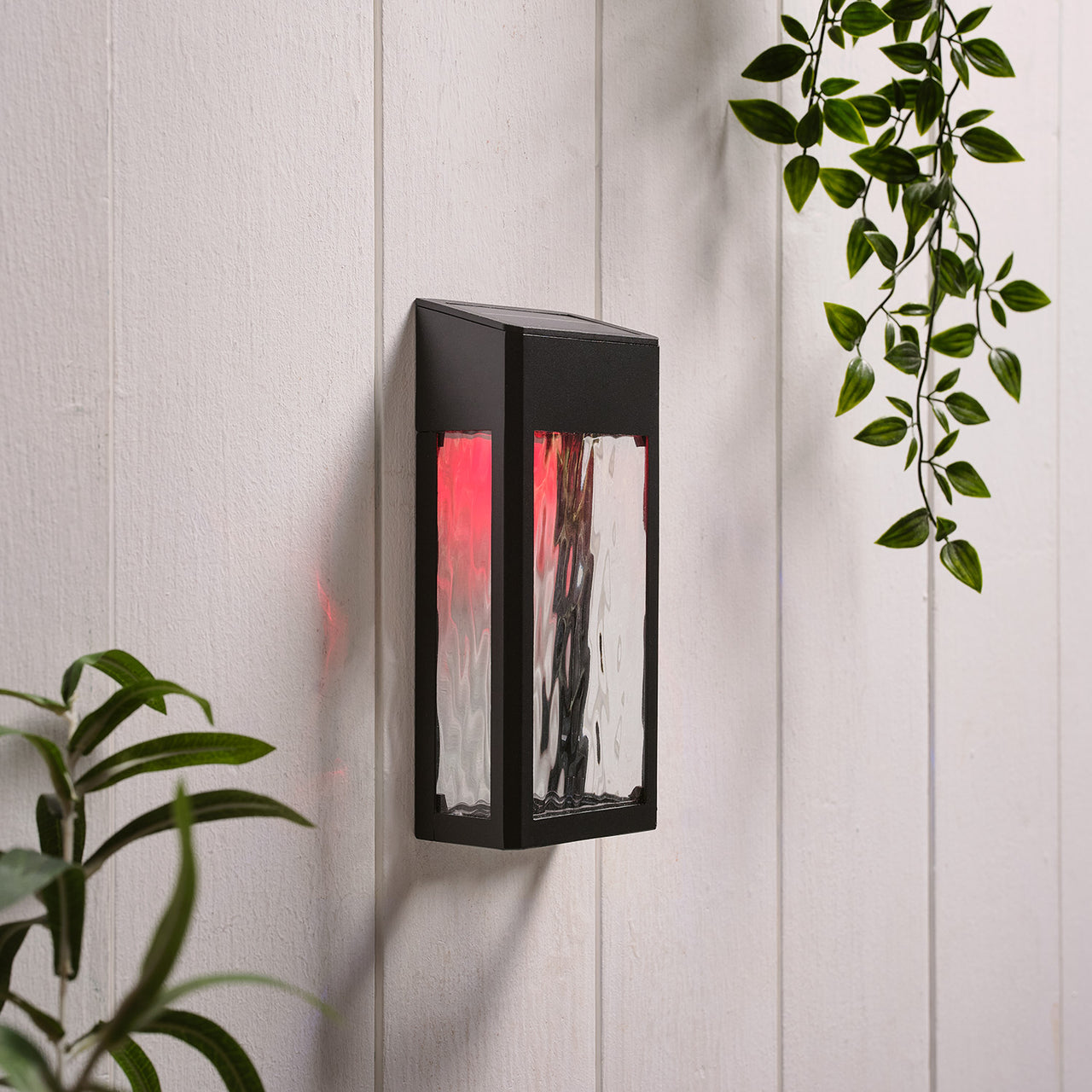LED Solar Wandleuchte aus Glas schwarz