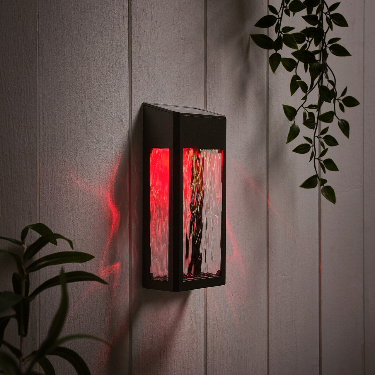 LED Solar Wandleuchte aus Glas schwarz