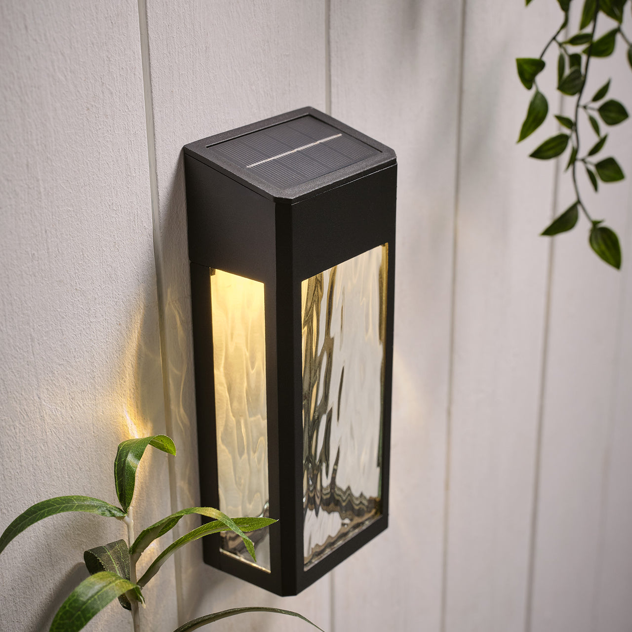 LED Solar Wandleuchte aus Glas schwarz