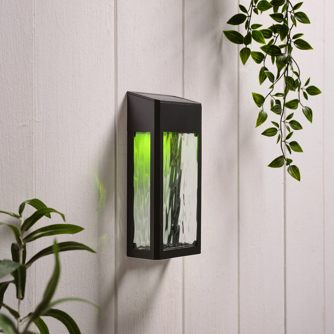 LED Solar Wandleuchte aus Glas schwarz
