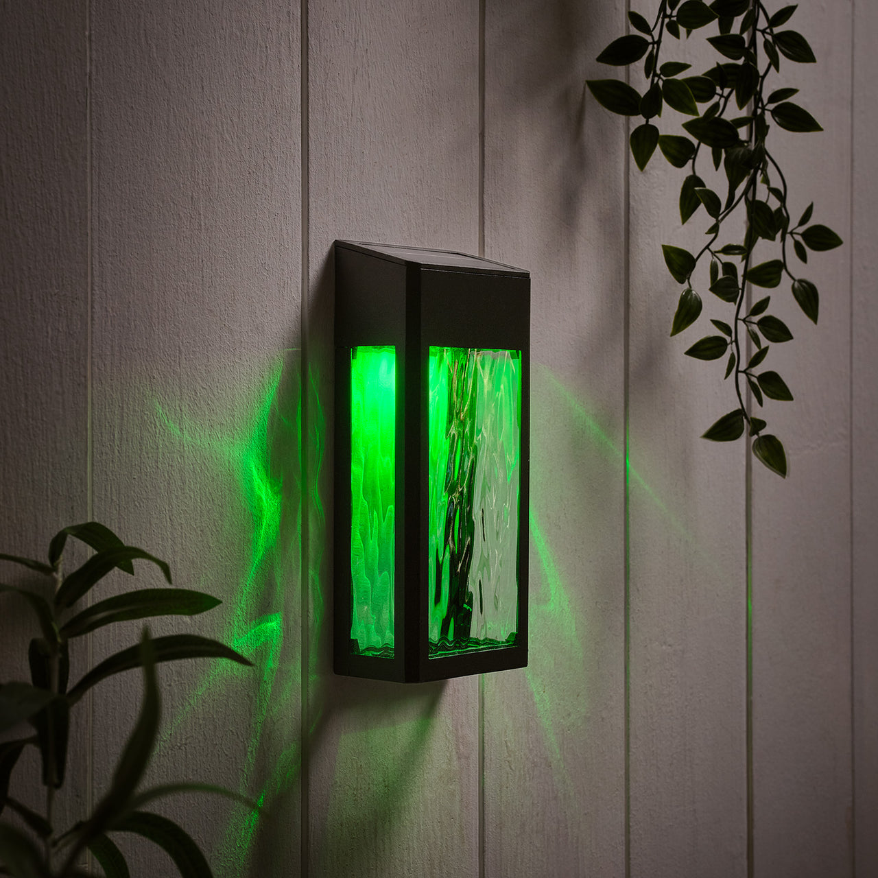 LED Solar Wandleuchte aus Glas schwarz