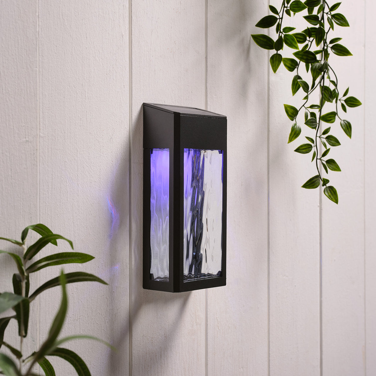 LED Solar Wandleuchte aus Glas schwarz