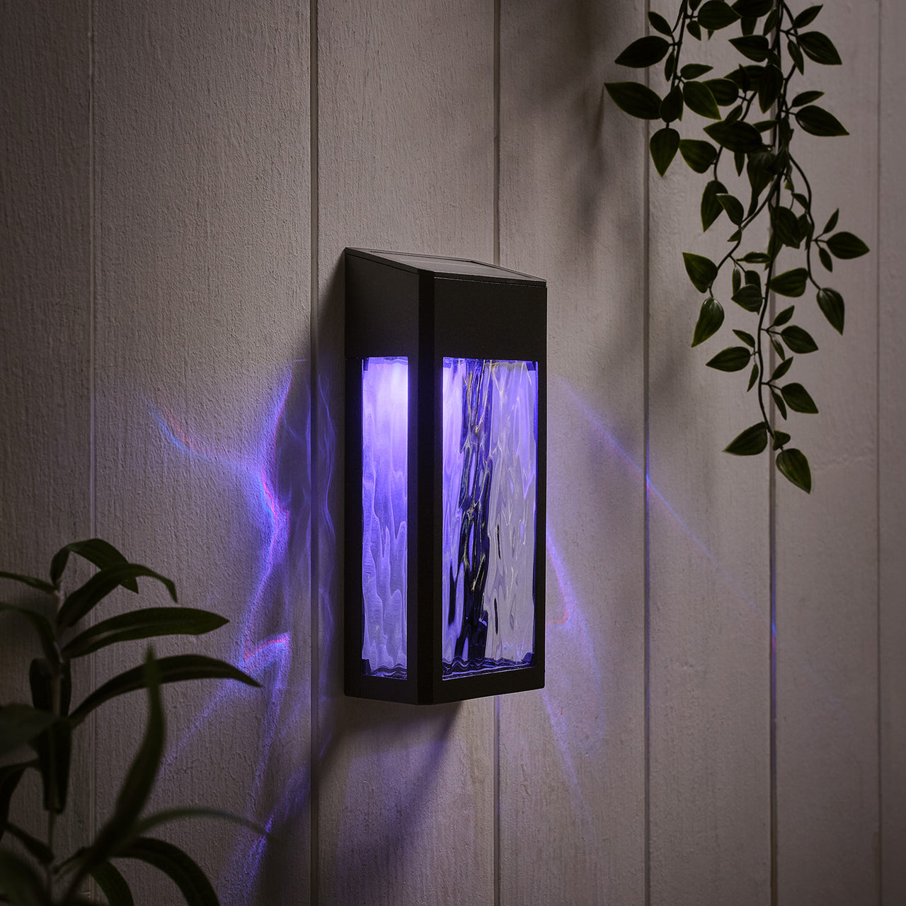 LED Solar Wandleuchte aus Glas schwarz