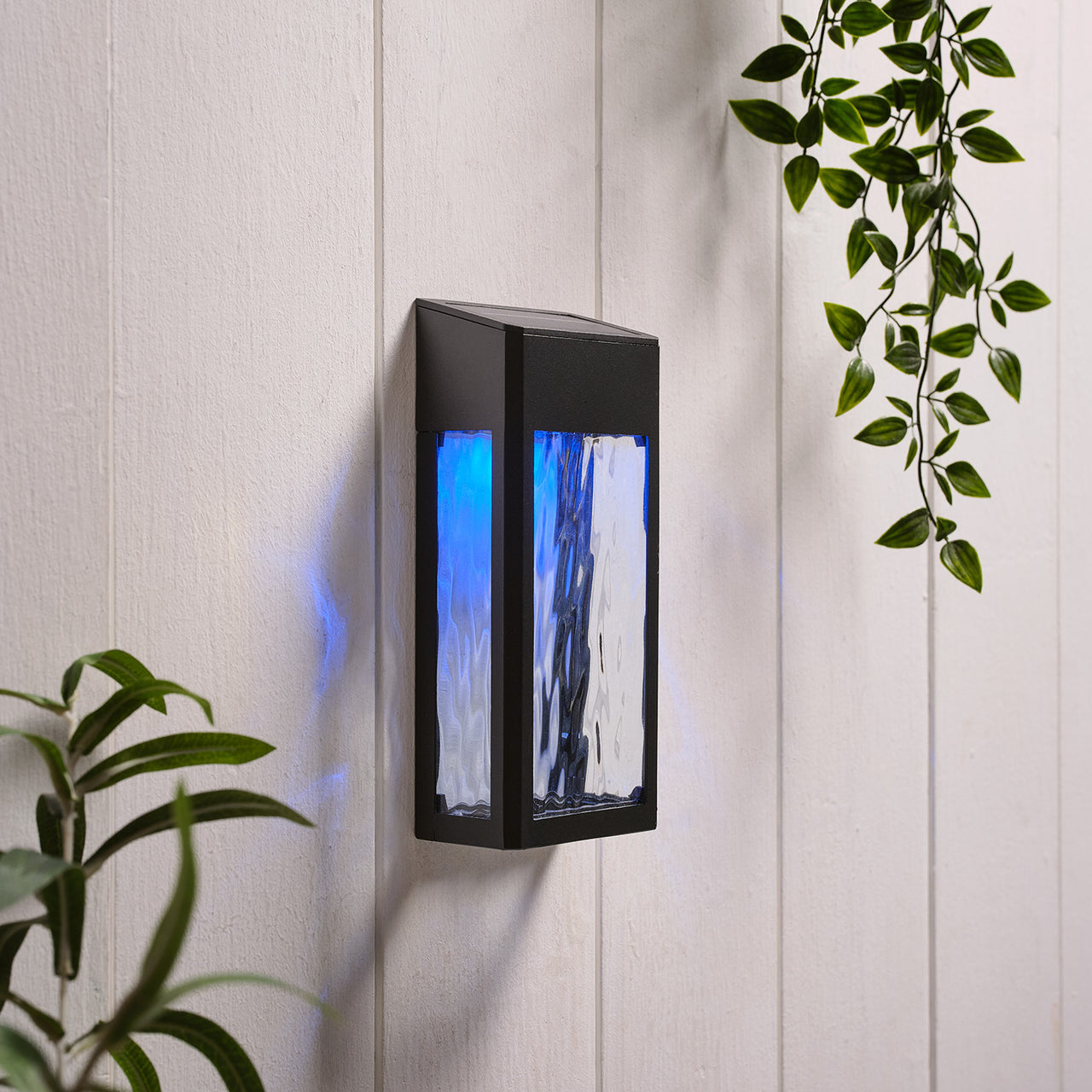 LED Solar Wandleuchte aus Glas schwarz