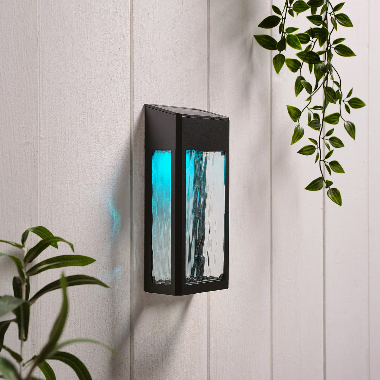 LED Solar Wandleuchte aus Glas schwarz