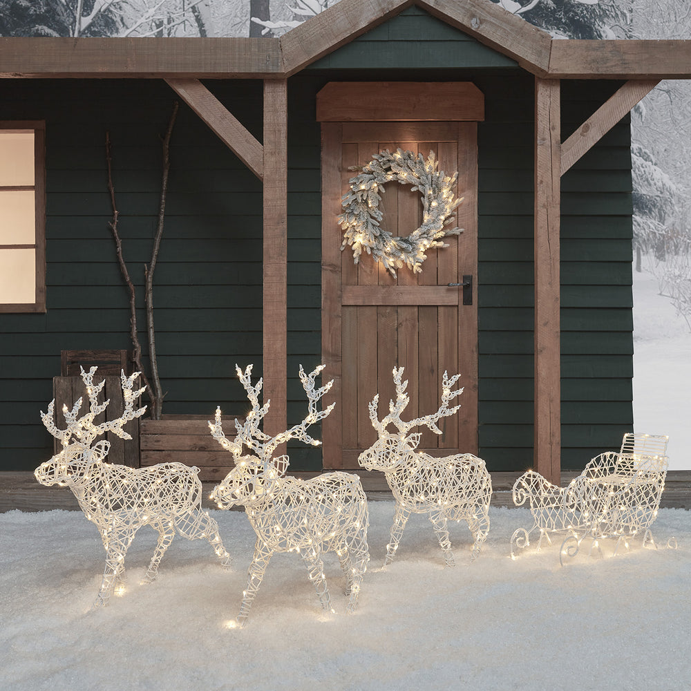 3er Set Batteriebetriebene LED-Rentiere mit Schlitten Arkendale