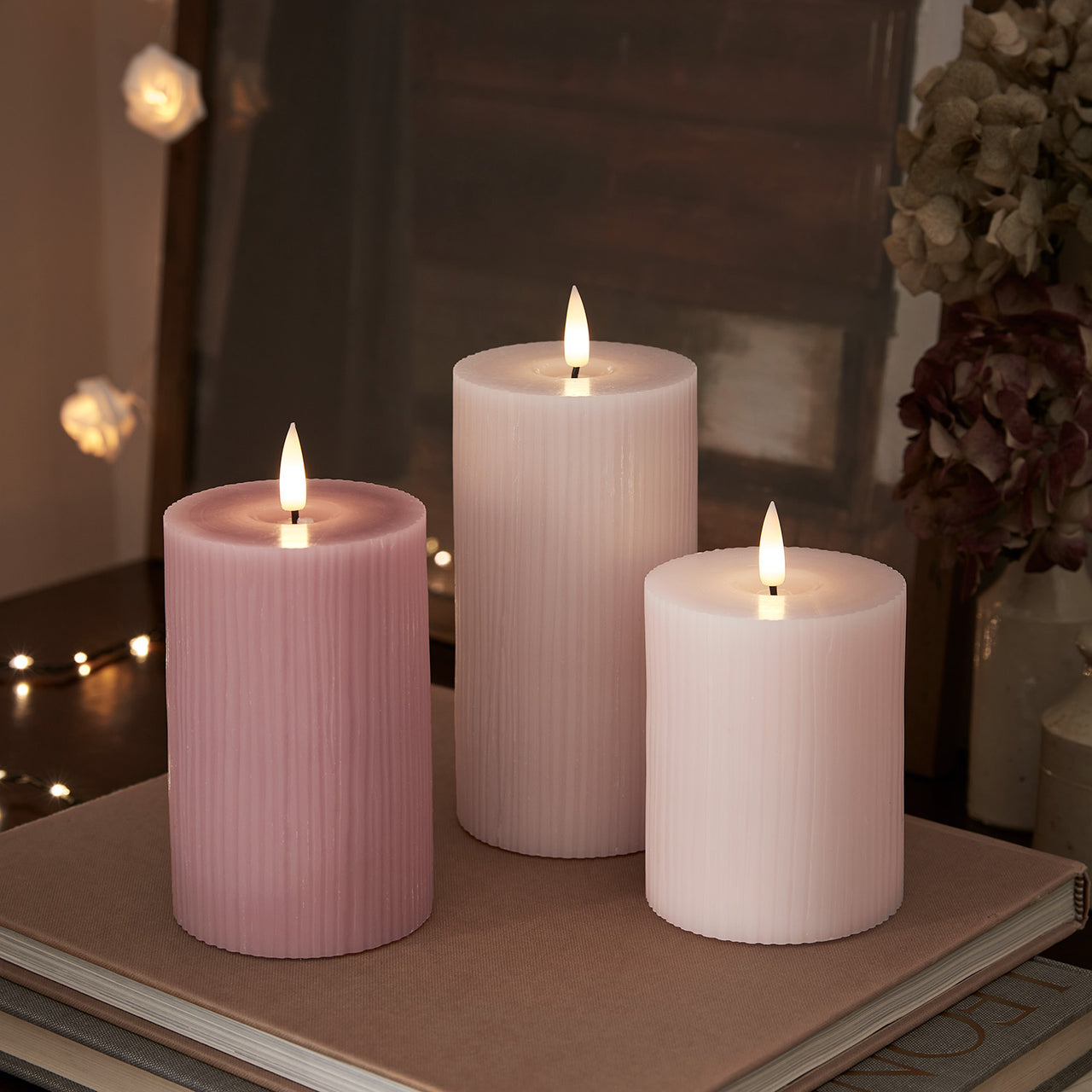 TruGlow® LED Kerzen Echtwach Trio geriffelt rosa